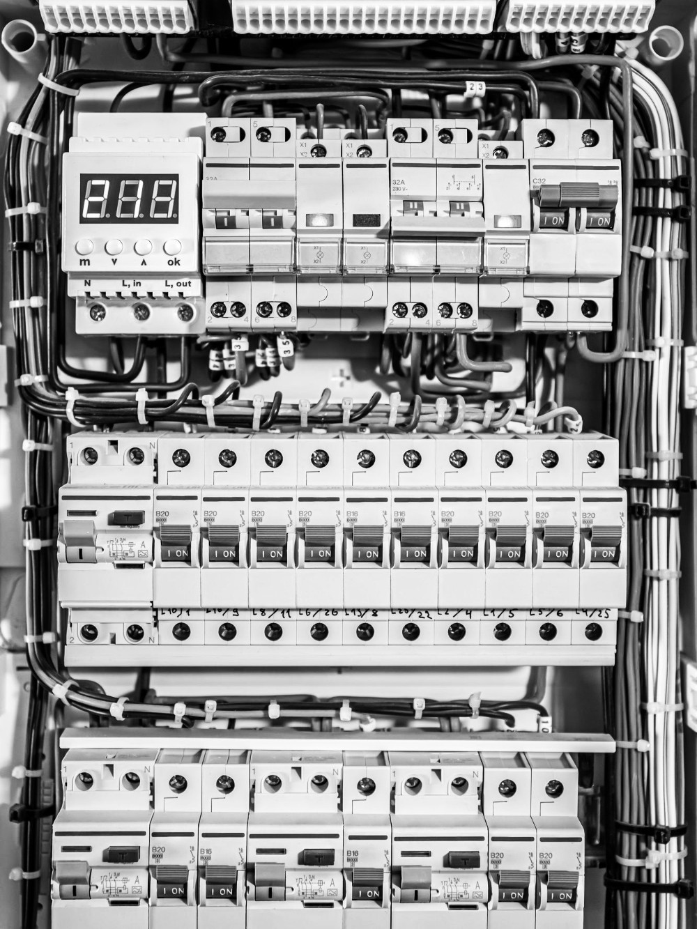 An electrical board with a lot of switches
