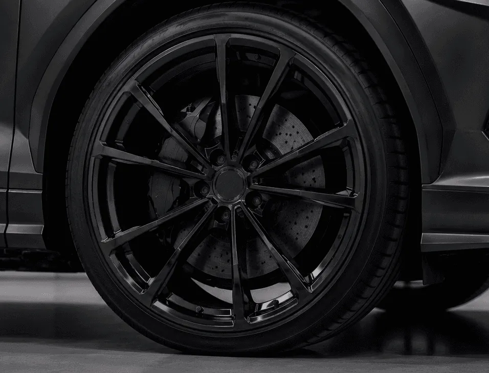 Black car wheel with custom rims