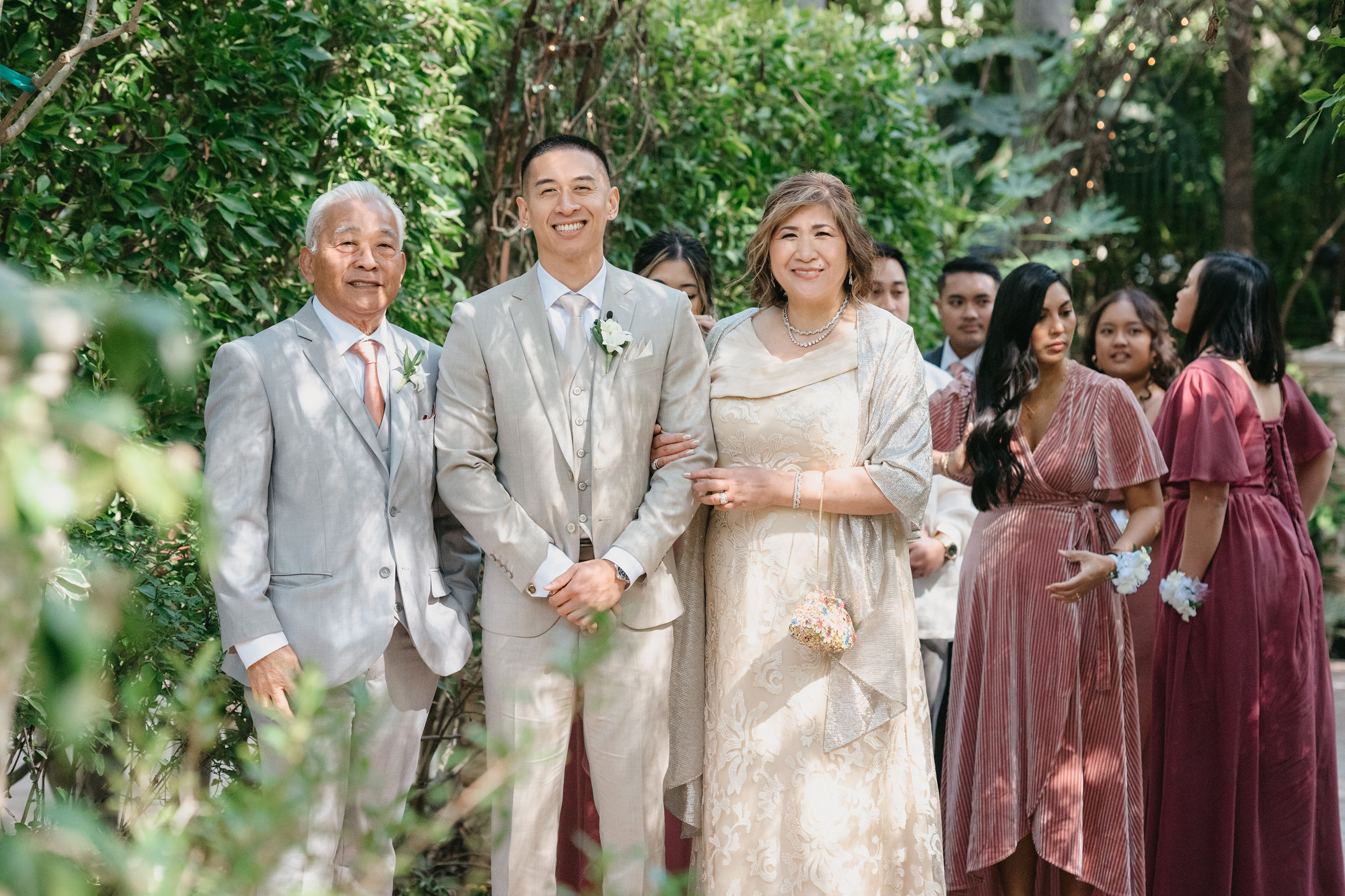Flat lay wedding details with bouquet, rings, and sparkling bridal heels