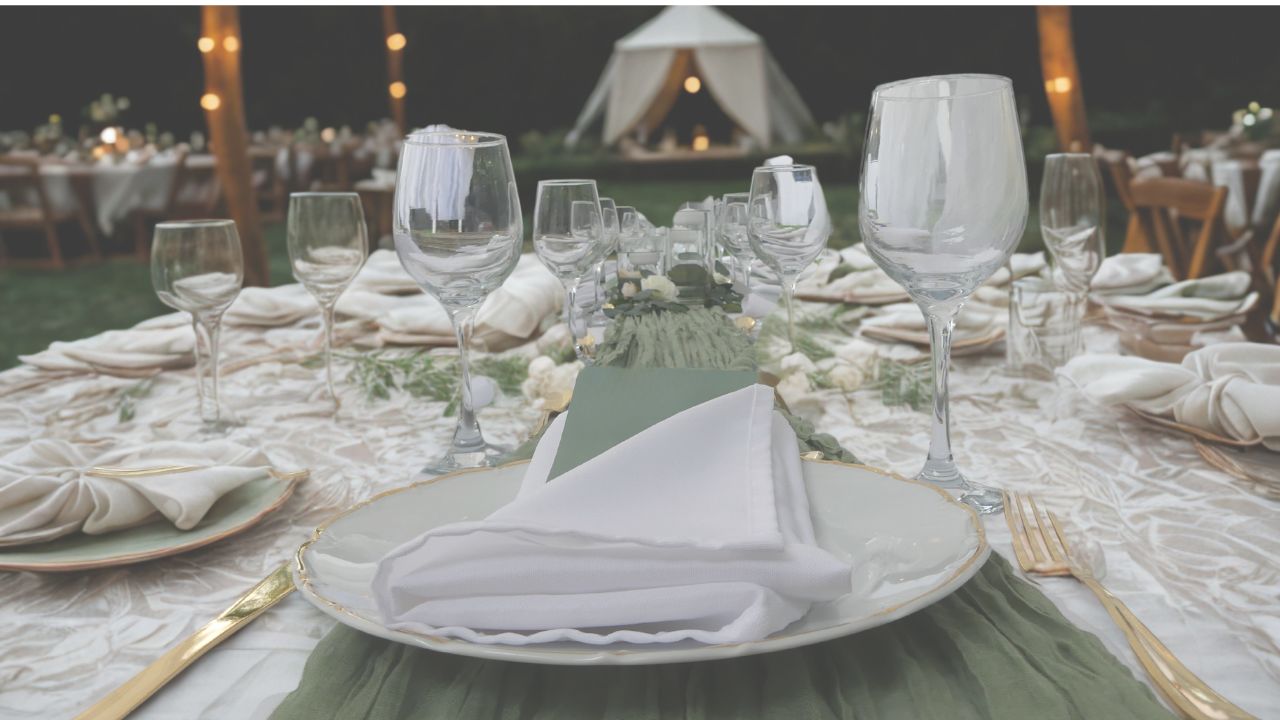A wedding tablescape with greens