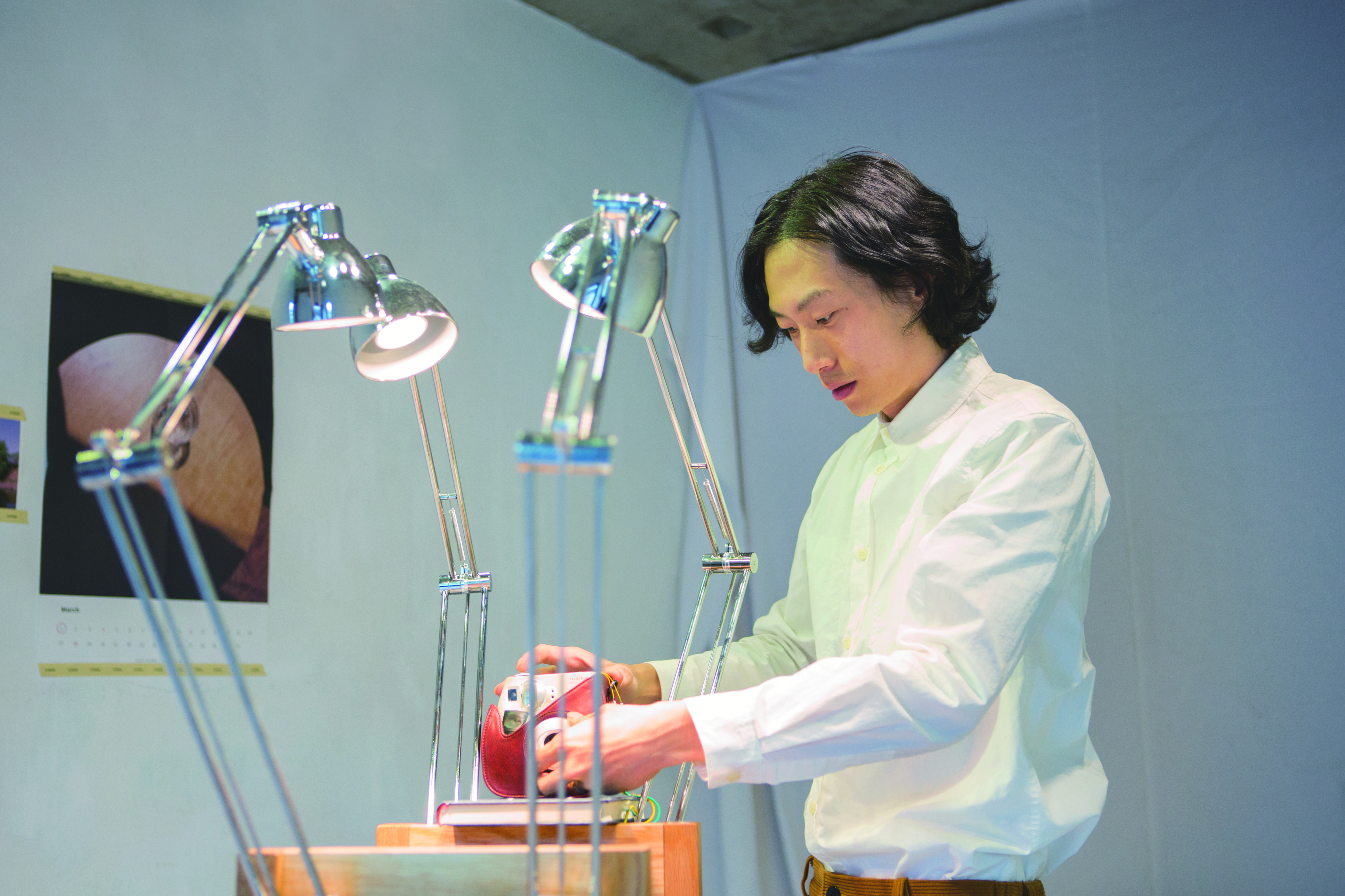 a purple ball of rope on a white background
