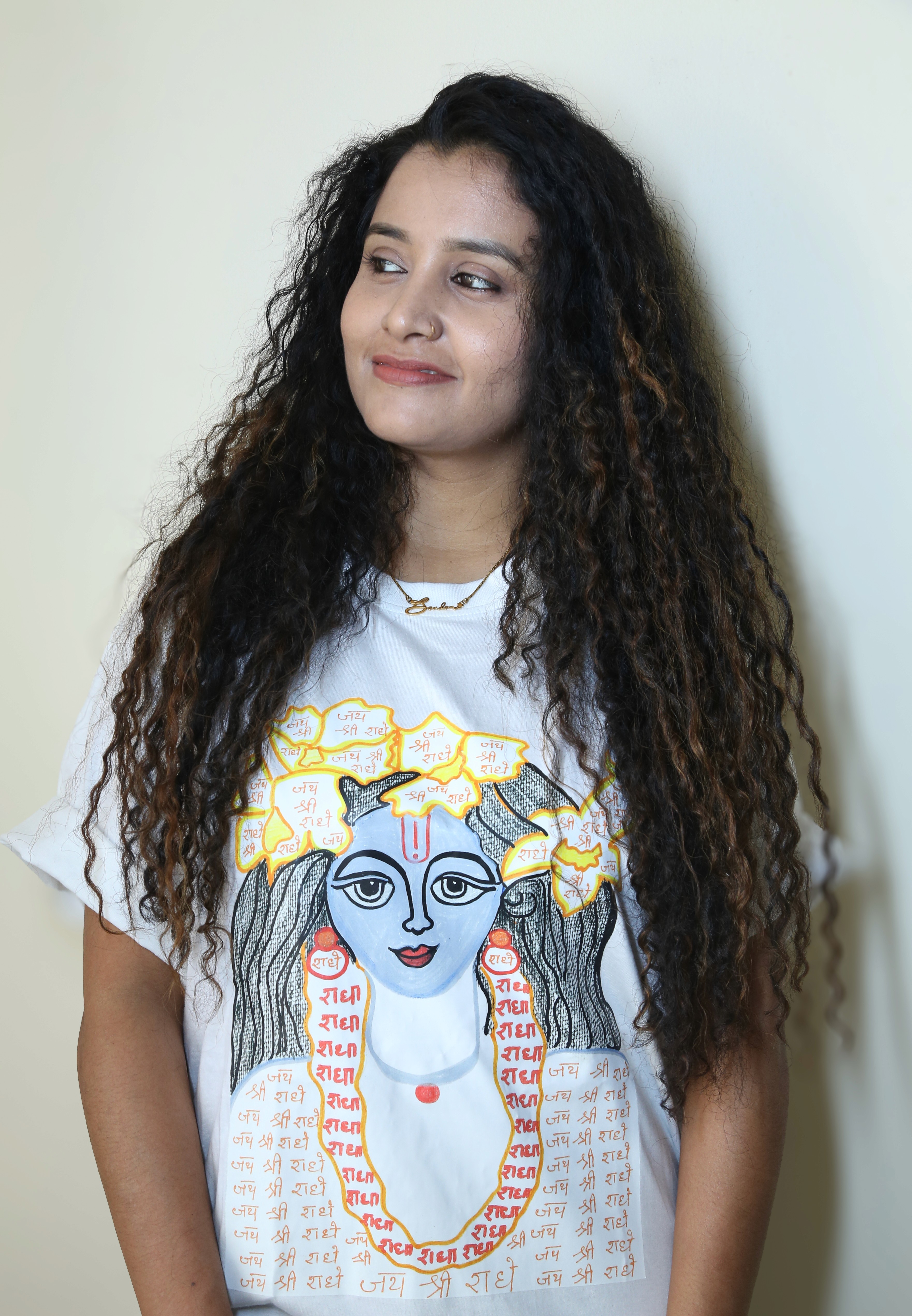 Woman holding the dark green bag