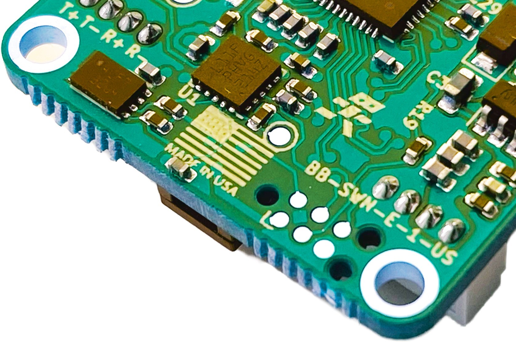 Close-up of a BotBlox SwitchBlox Nano US-variant PCB with a Made in USA flag on the silkscreen
