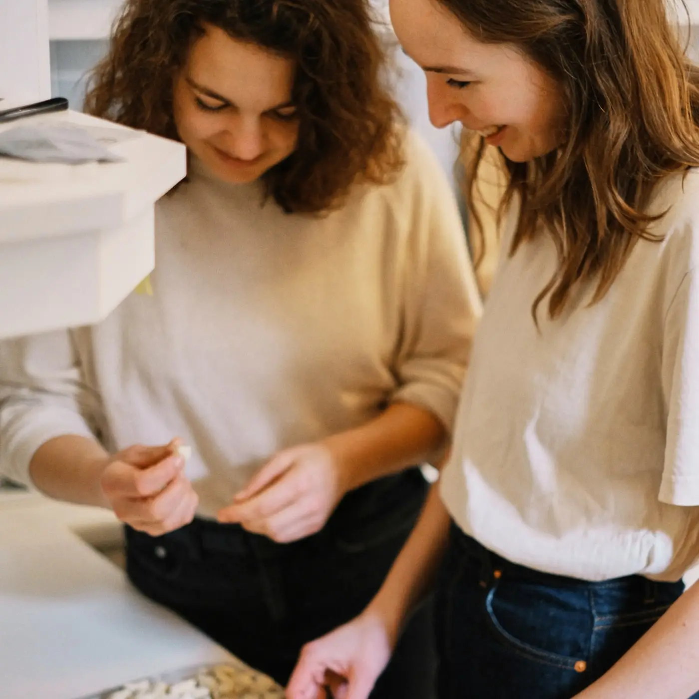 Stefi and Melissa looking at their ravioli
