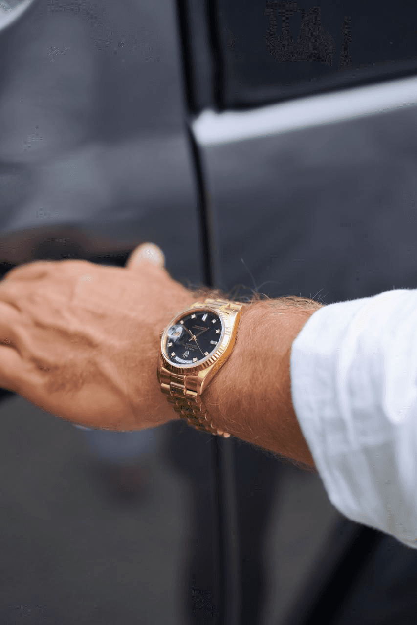 person holding black dslr camera