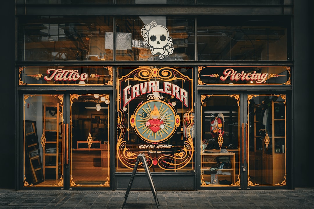Tattoo and piercing shop with ornate signage