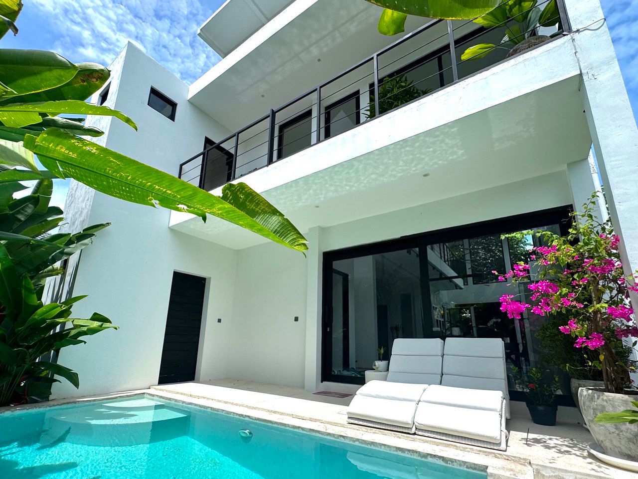 A 2-bedroom villa in Canggu, Tumbak Bayuh, with a rooftop, two terraces, and panoramic rice field views