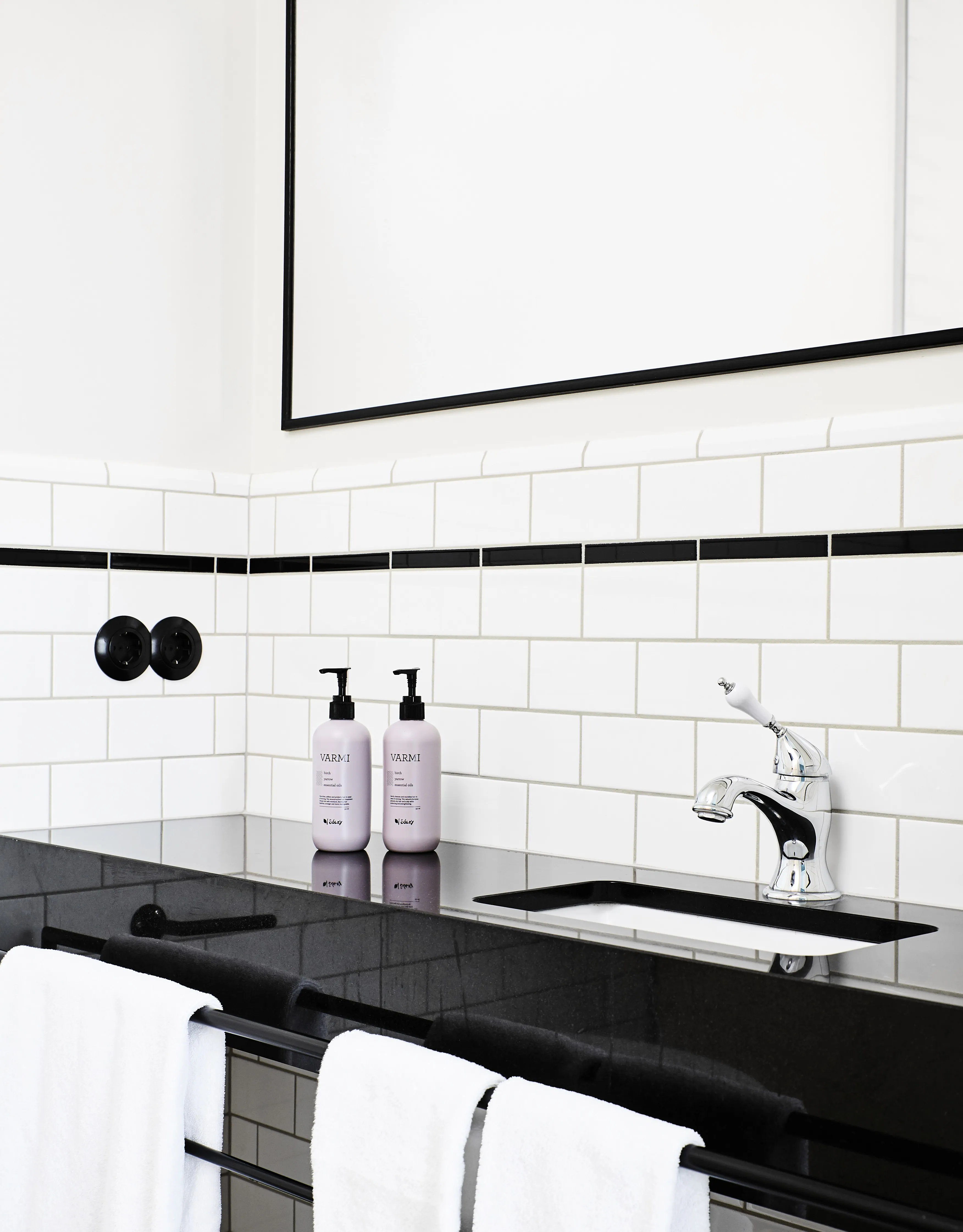 clean wastafel with bottle of soap