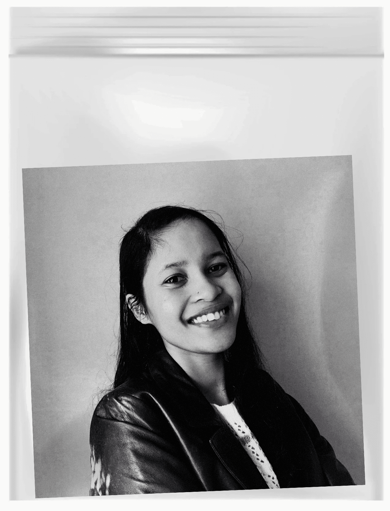 A black and white photo of Nadia Ariefdien in a clear ziploc bag.