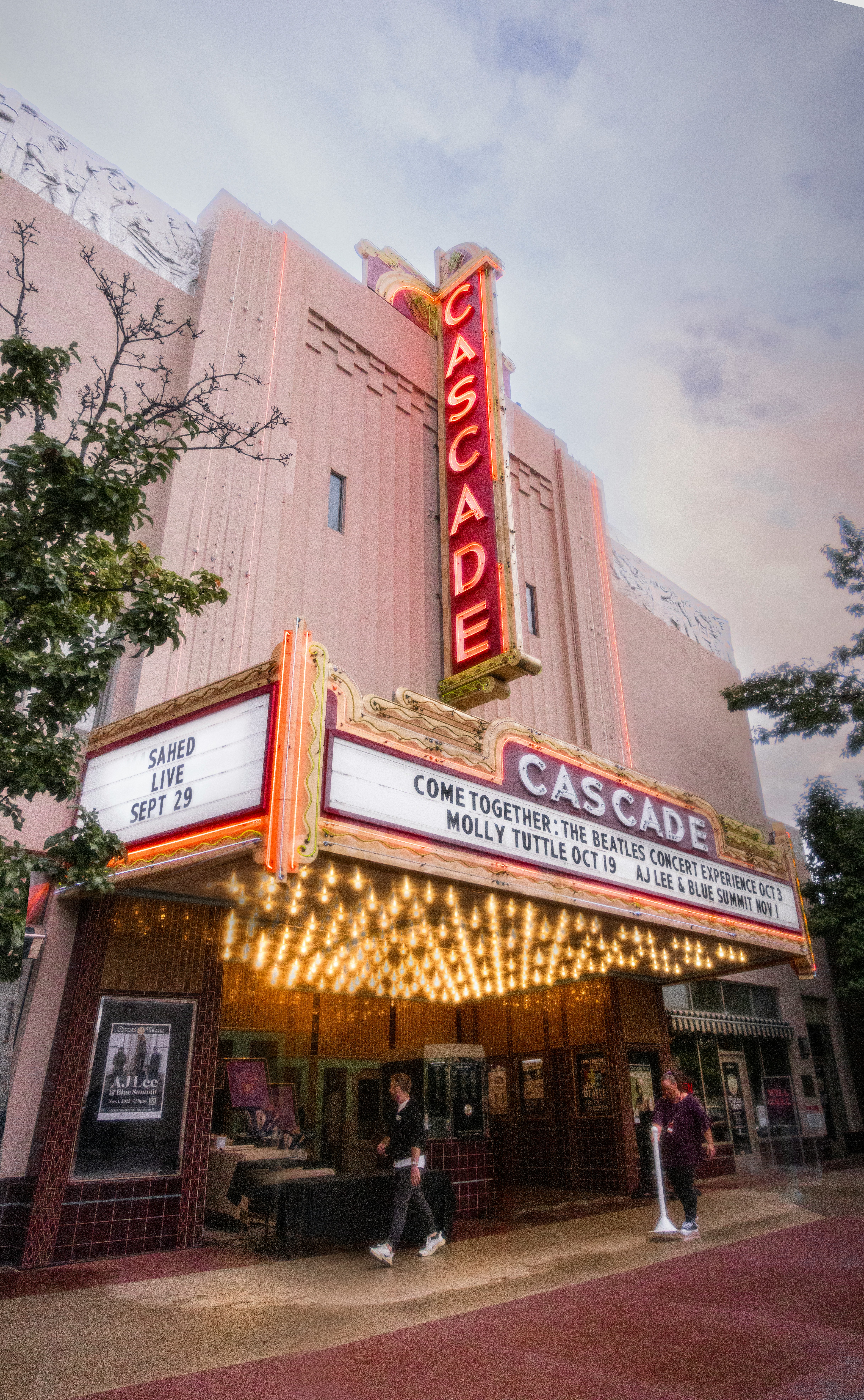Cascade theater entrance with marquee and marquee lights.