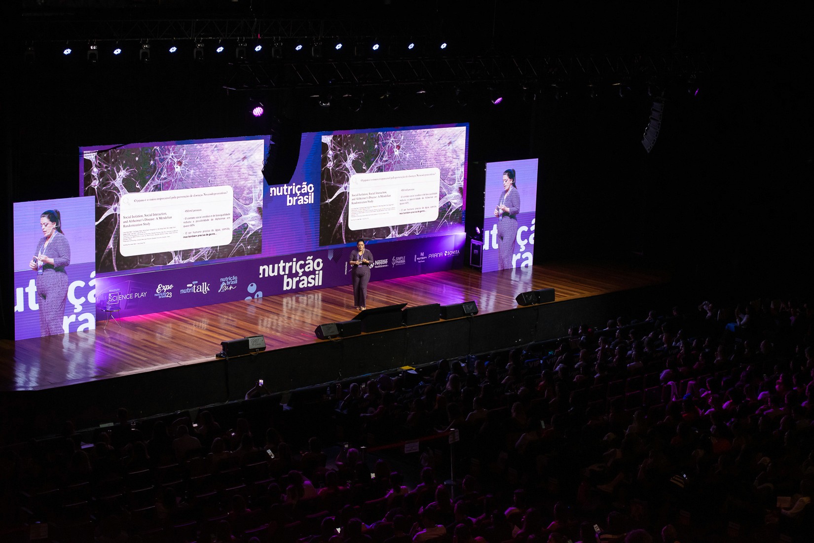 Woman talking to a Man using Mic