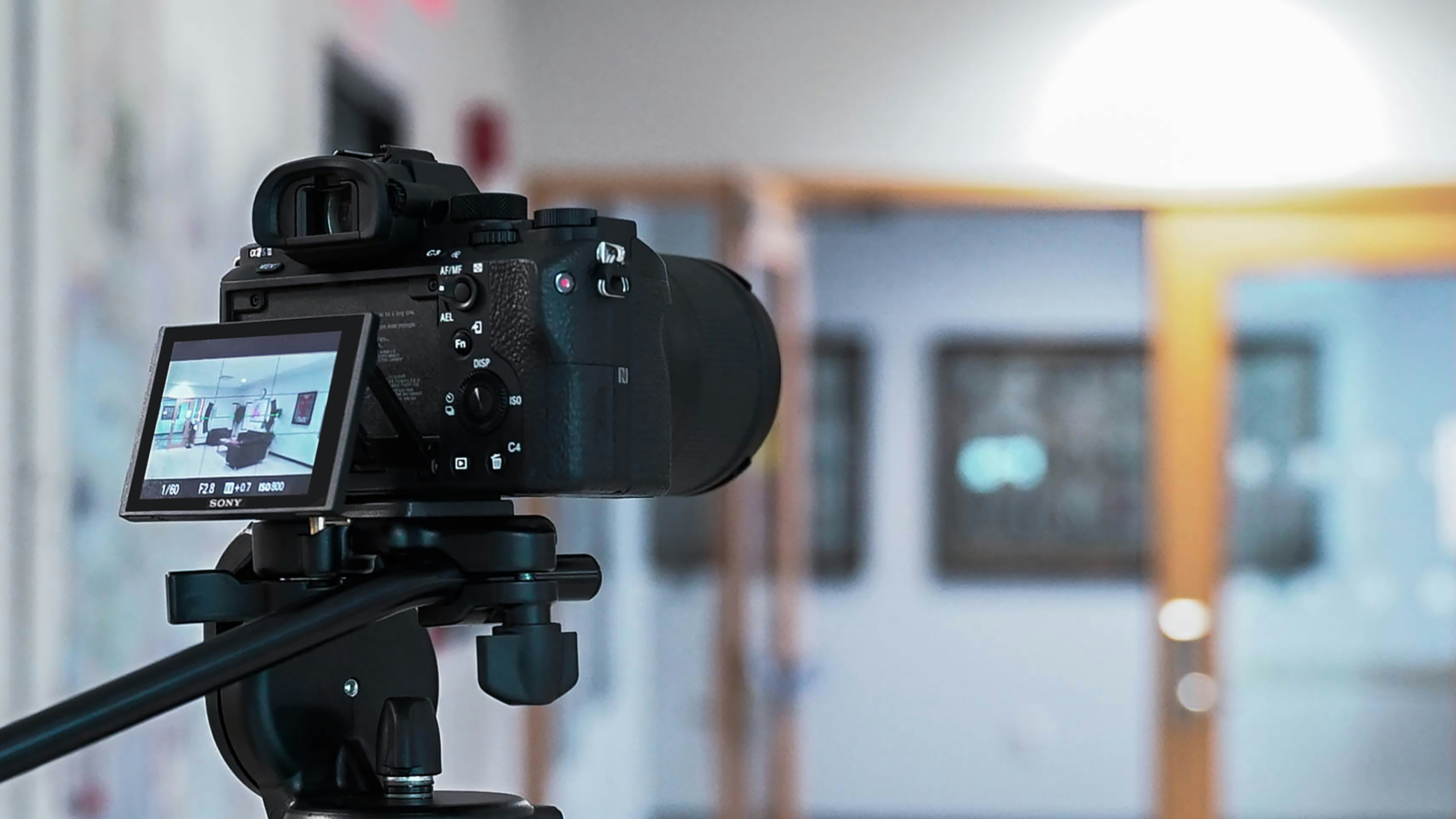 a camera on a tripod in a room