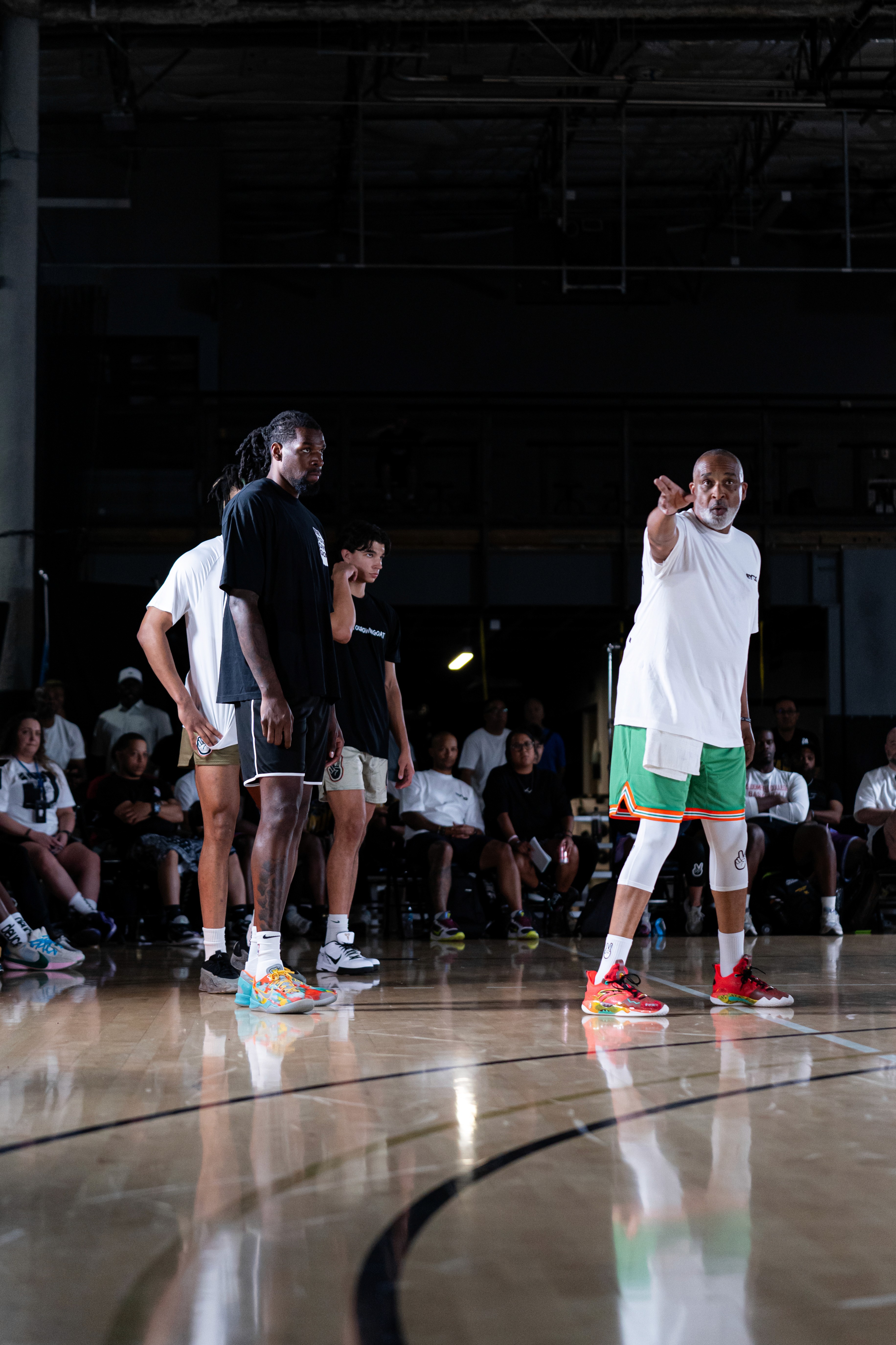 Coach Handy working out with Naz Reid