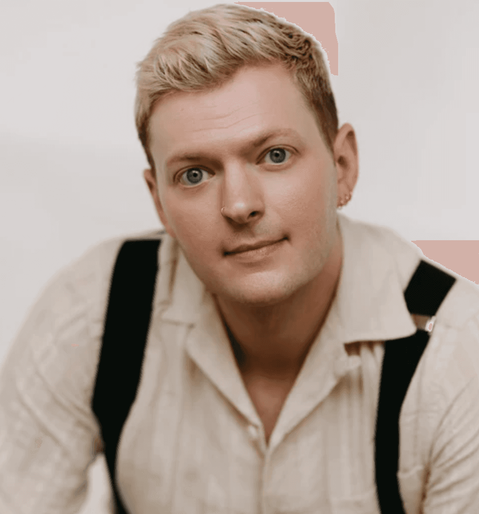 Professional portrait of a man in a navy suit