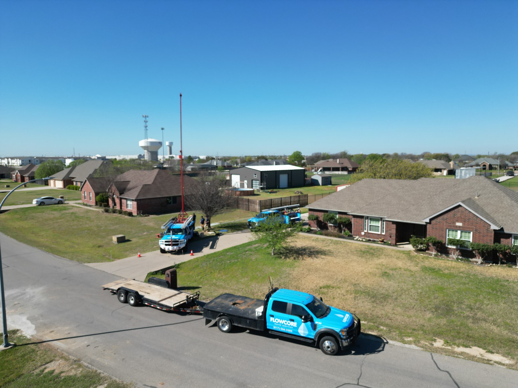 Flowcore Trucks and Crew at work