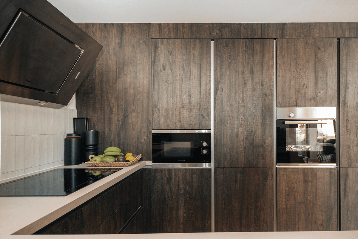 Streetside billboard with flyposters of the Batch.Works brand and illustrations