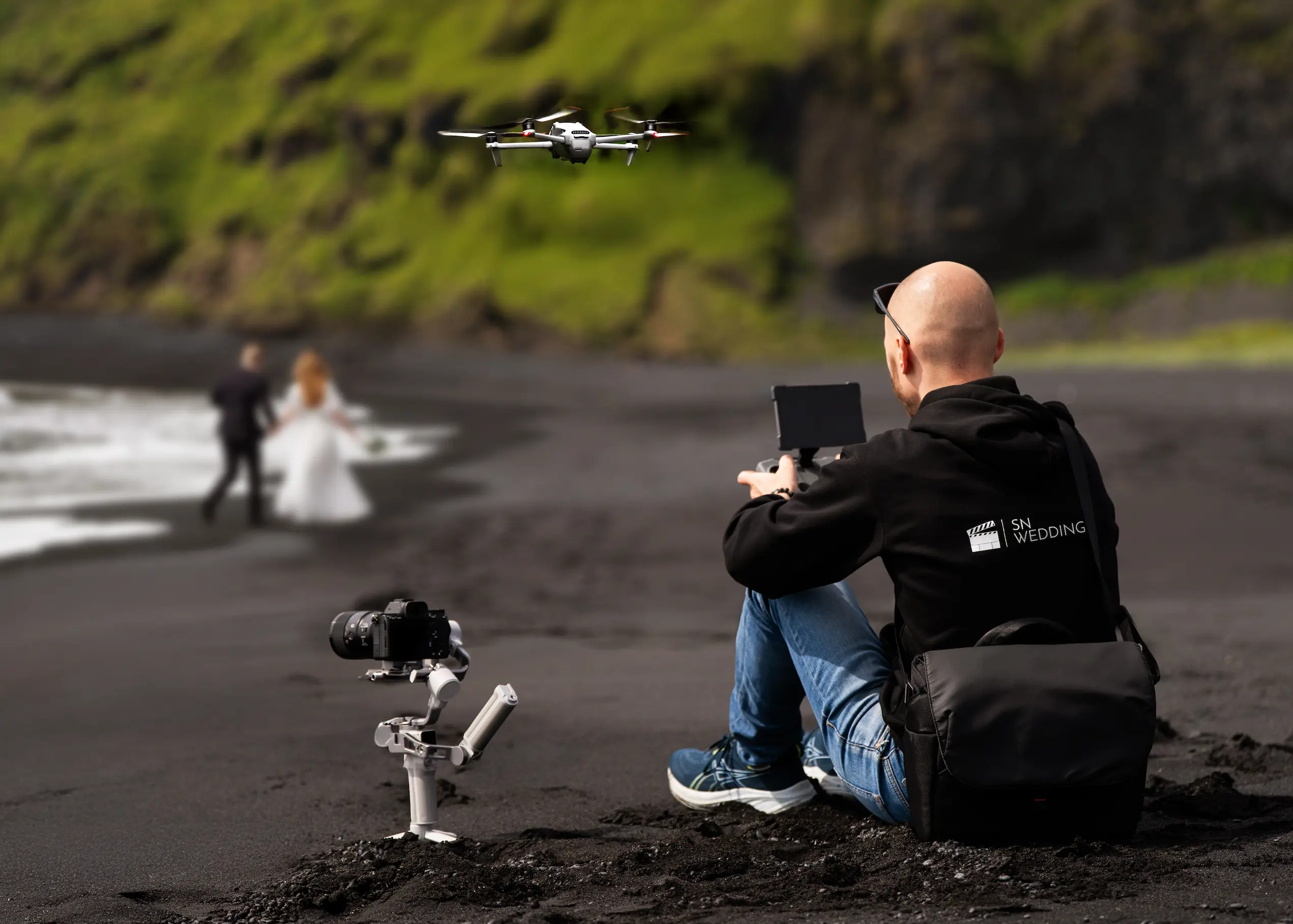 Silhouette of a person holding a flashlight at night.