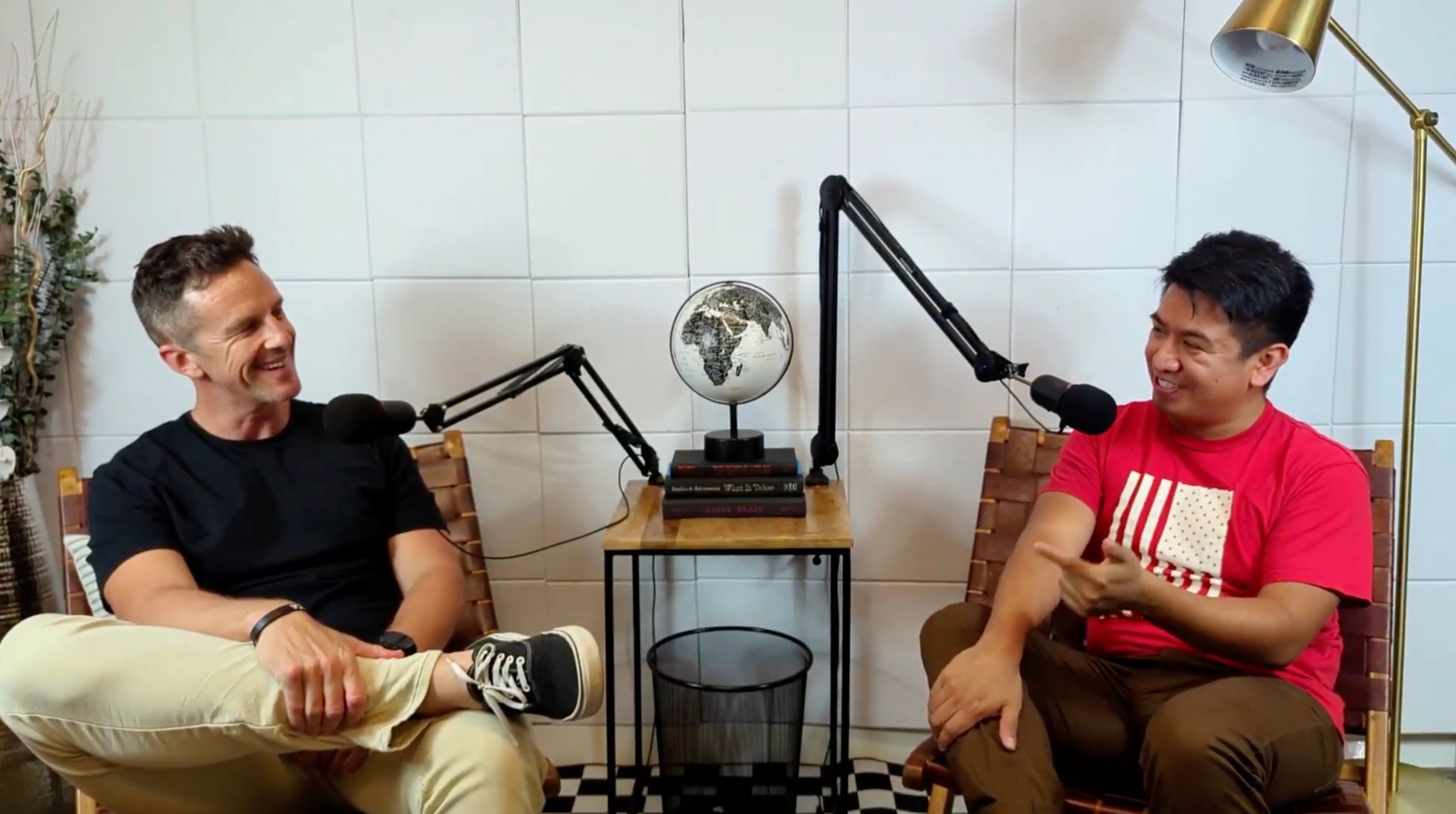 a black and white living room with a large tv