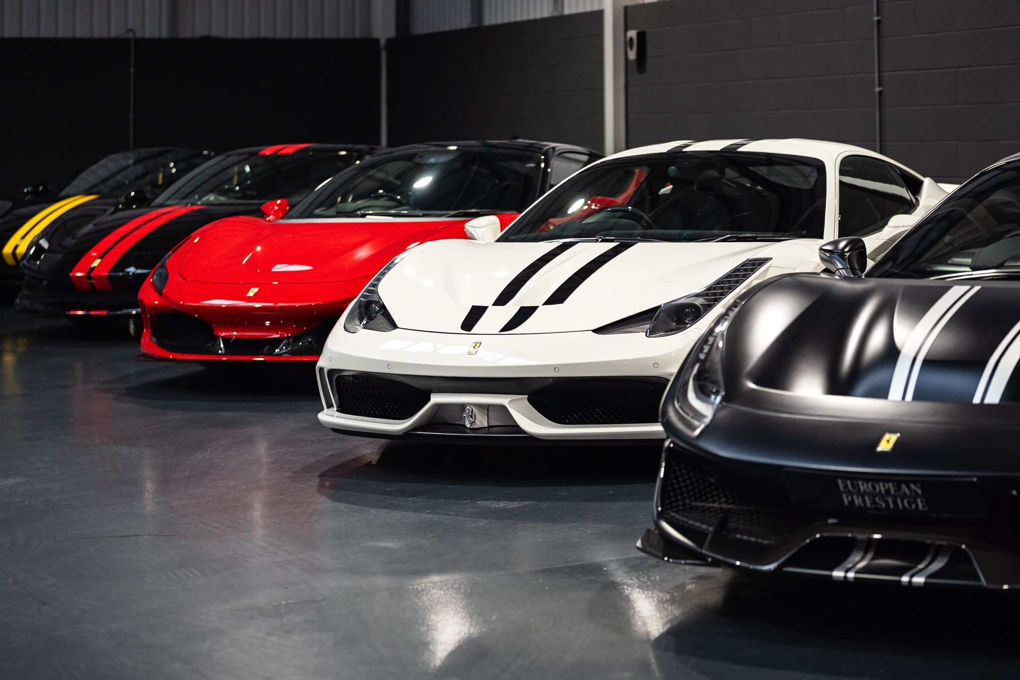 Ferrari 458 Speciales lined up in the European Prestige showroom