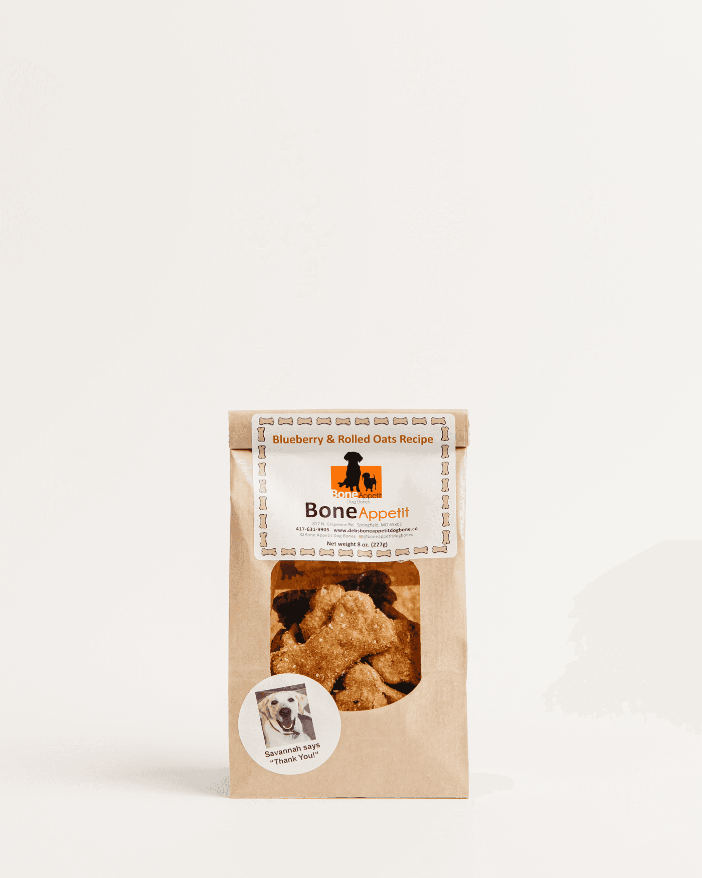 Product photography of dog treats in a kraft bag on a white background