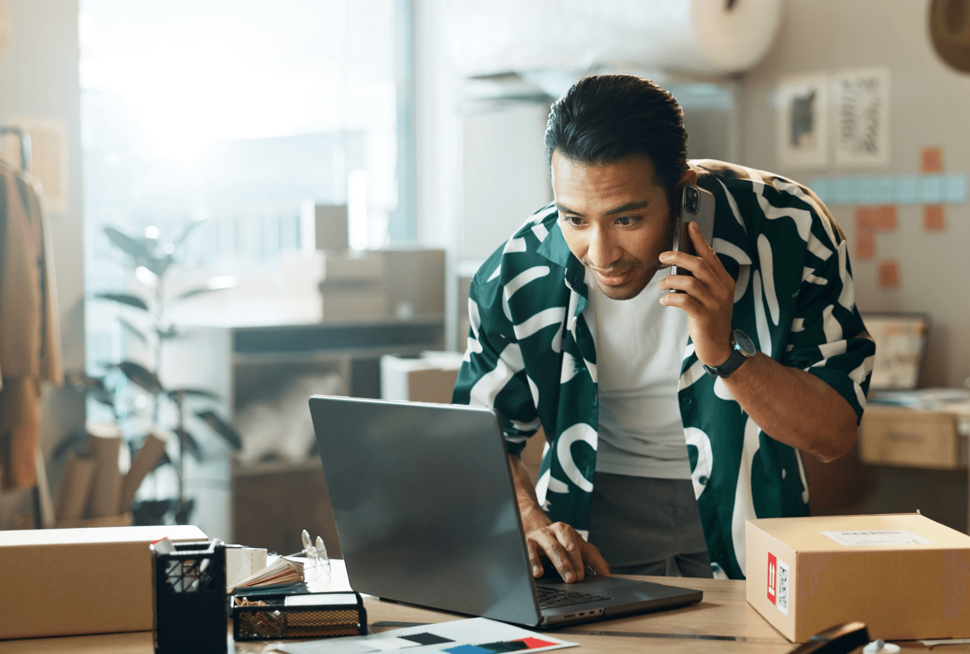 man-boxes-phone-call-e-commerce-logistics