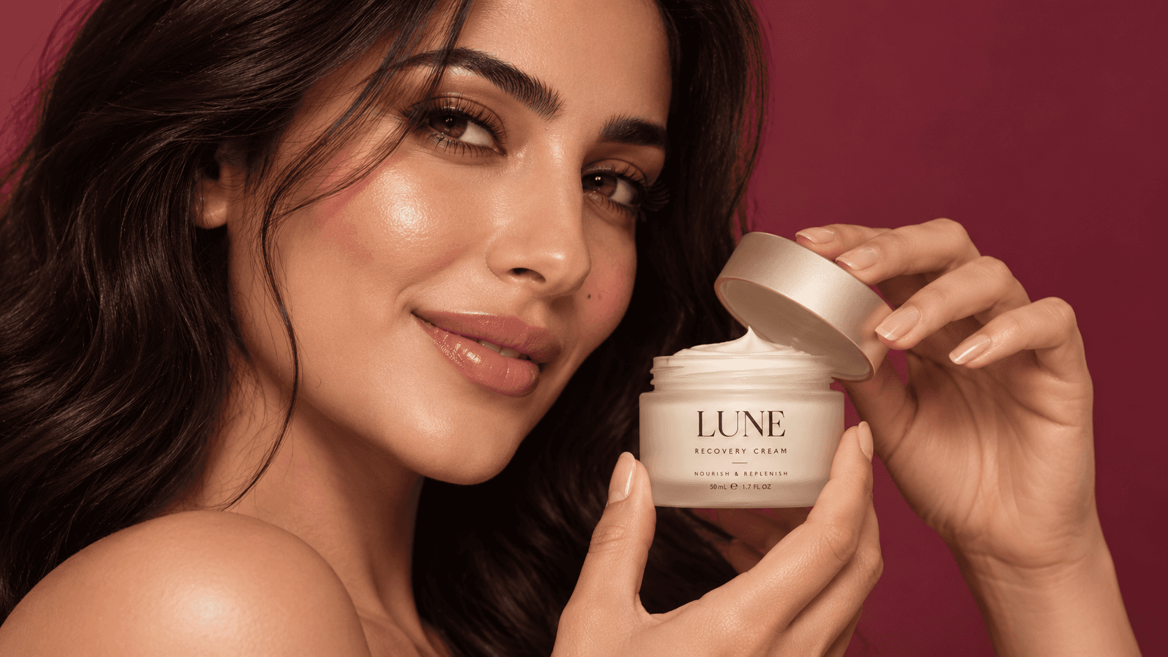 A woman applying a LUNE formula