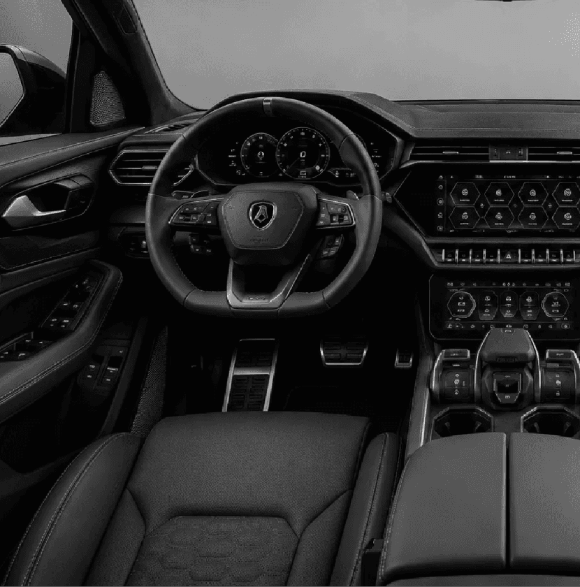 Car interior with dashboard, steering wheel, and seats.