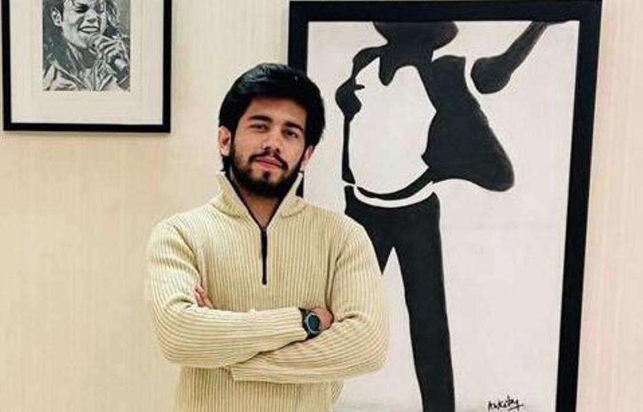 Group of men standing with Sufboard