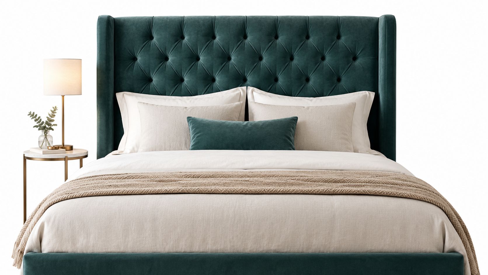 A luxurious emerald green tufted velvet headboard on a modern double bed with neutral bedding and accessories.