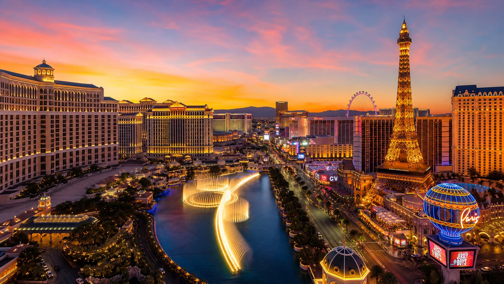 Las Vegas Strip at sunset with bright lights and hotels