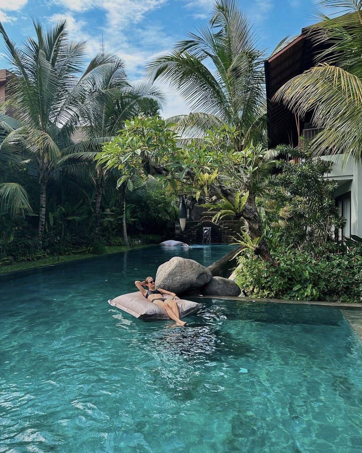 Riding a bicycle with V sign