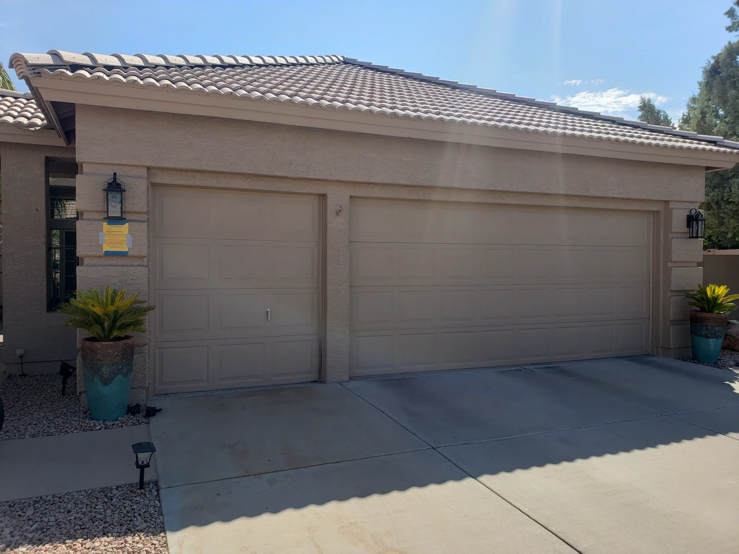 Broken garage door before replacement