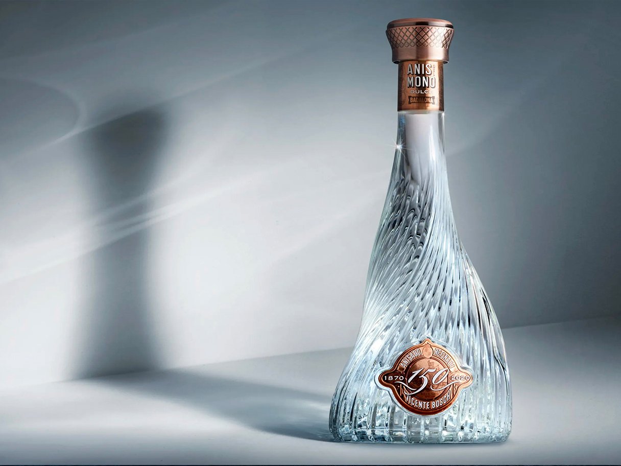 Rustic cabin in a golden field at sunset