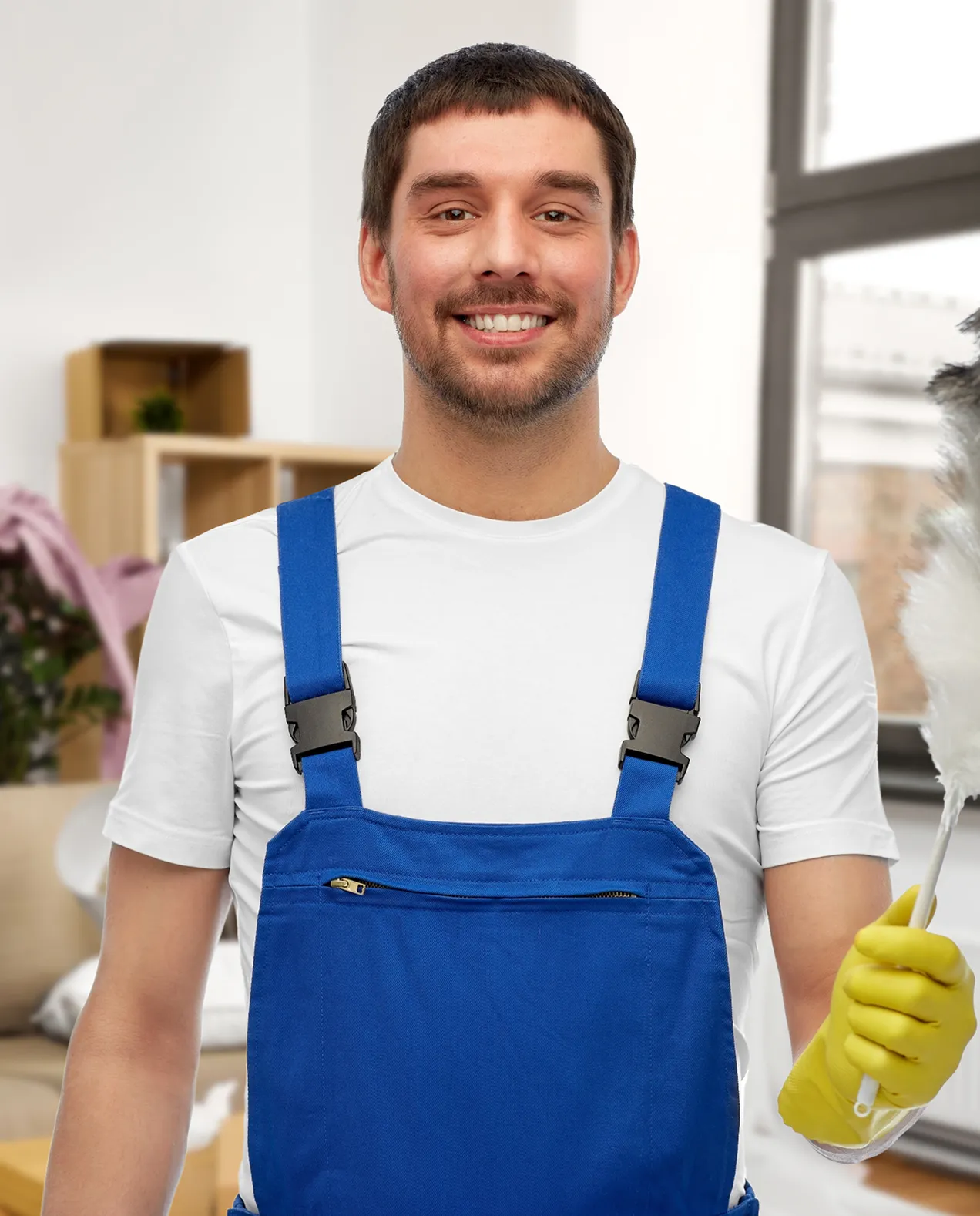 Professional portrait of Jackob Lee, a Junior Cleaner with 1 year of experience in commercial cleaning, wearing blue overalls and holding cleaning tools.