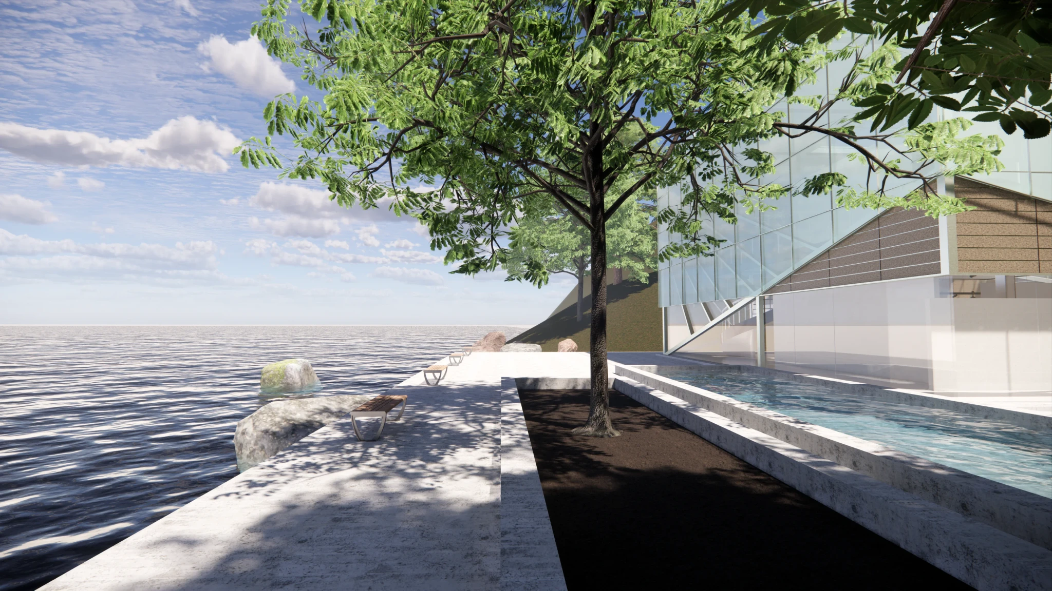 A sea promenade with a glass building at the right side
