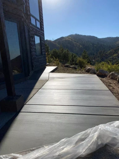 New concrete driveway with mountain views in Tucson