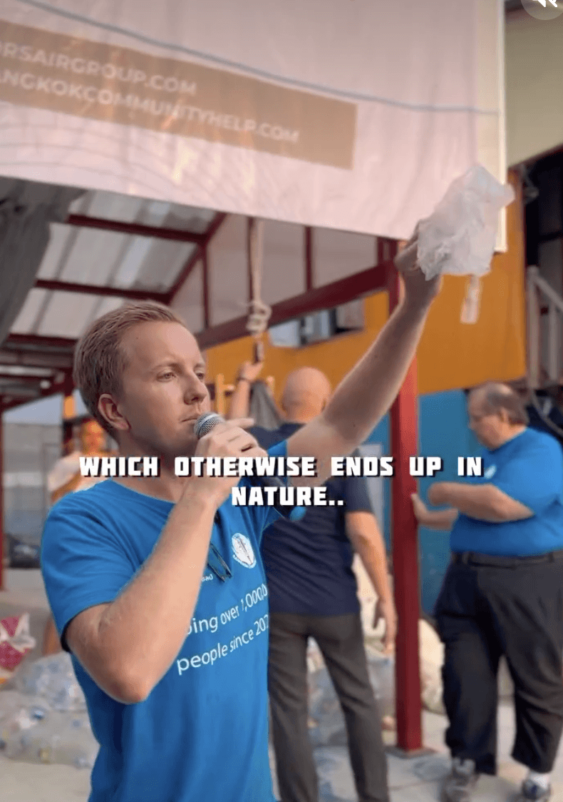 man in black crew neck t-shirt wearing black framed sunglasses