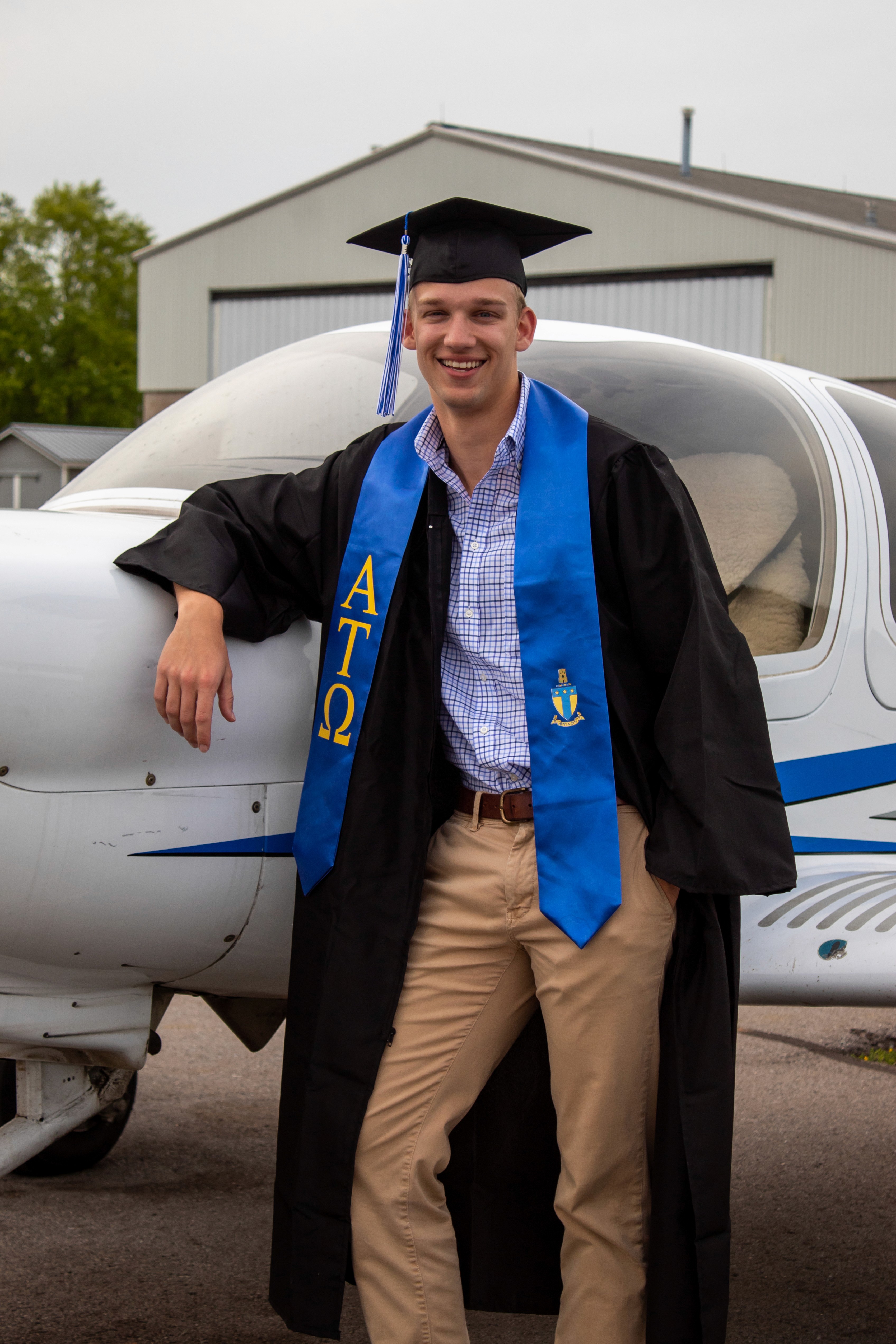 guy standing by an airplane
