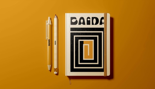 Branded stationery, including a pen, pencil, and notebook with a data visualization on its cover