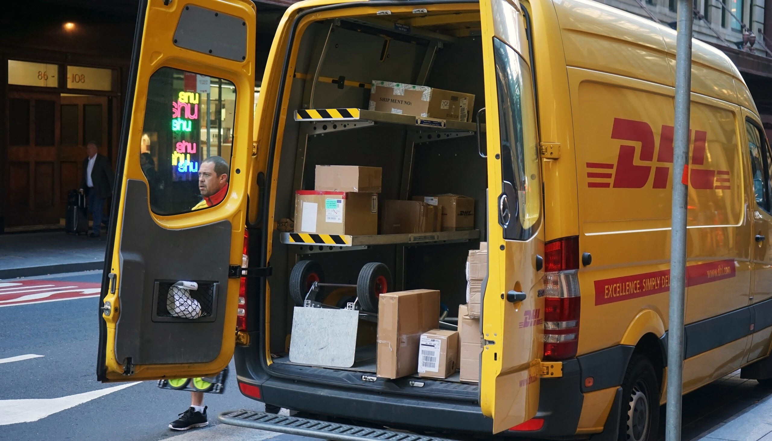 Package delivery van on street