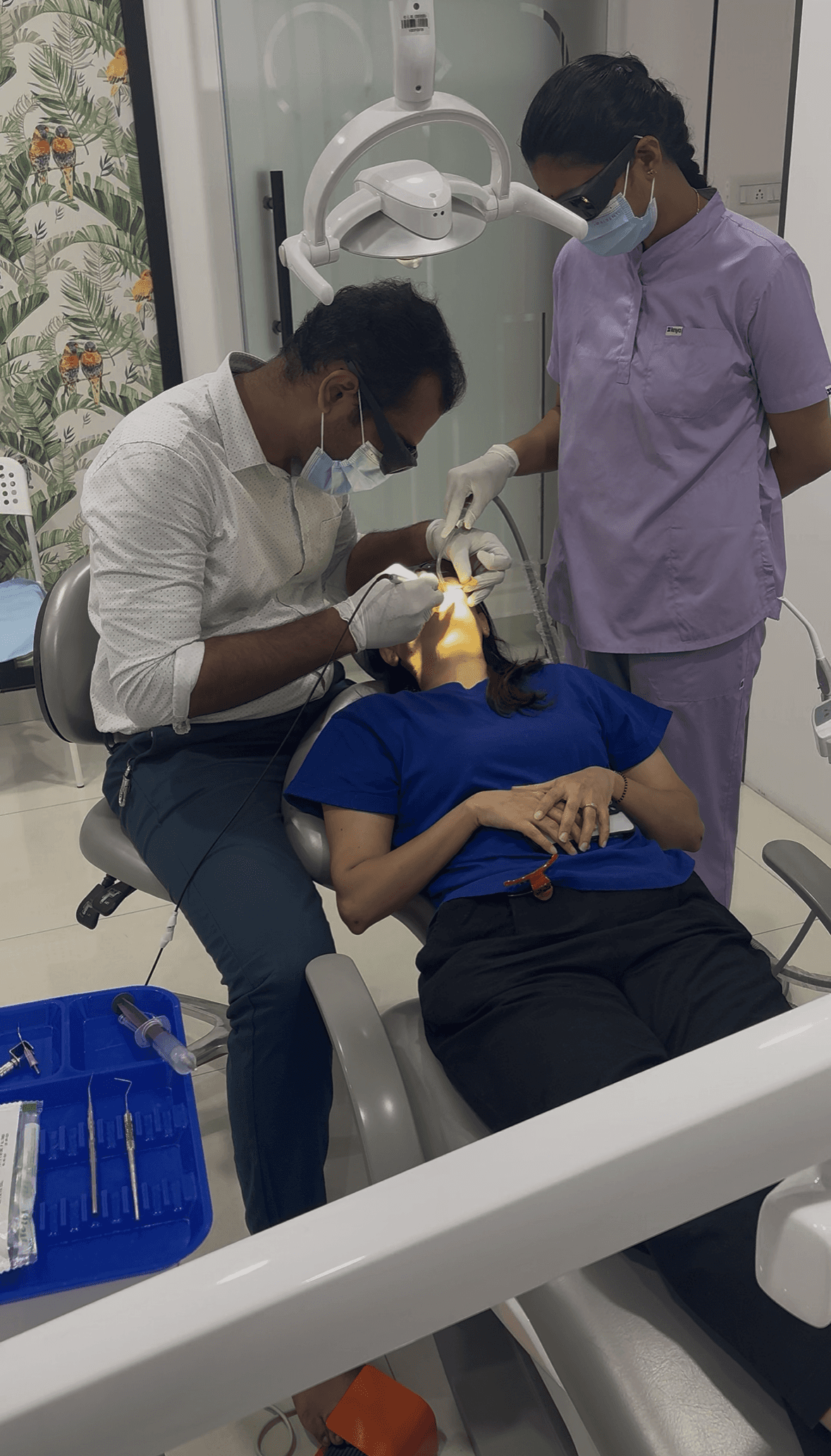 man in white dress shirt holding black pen