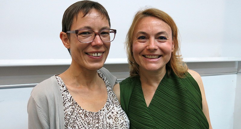 two women posing together