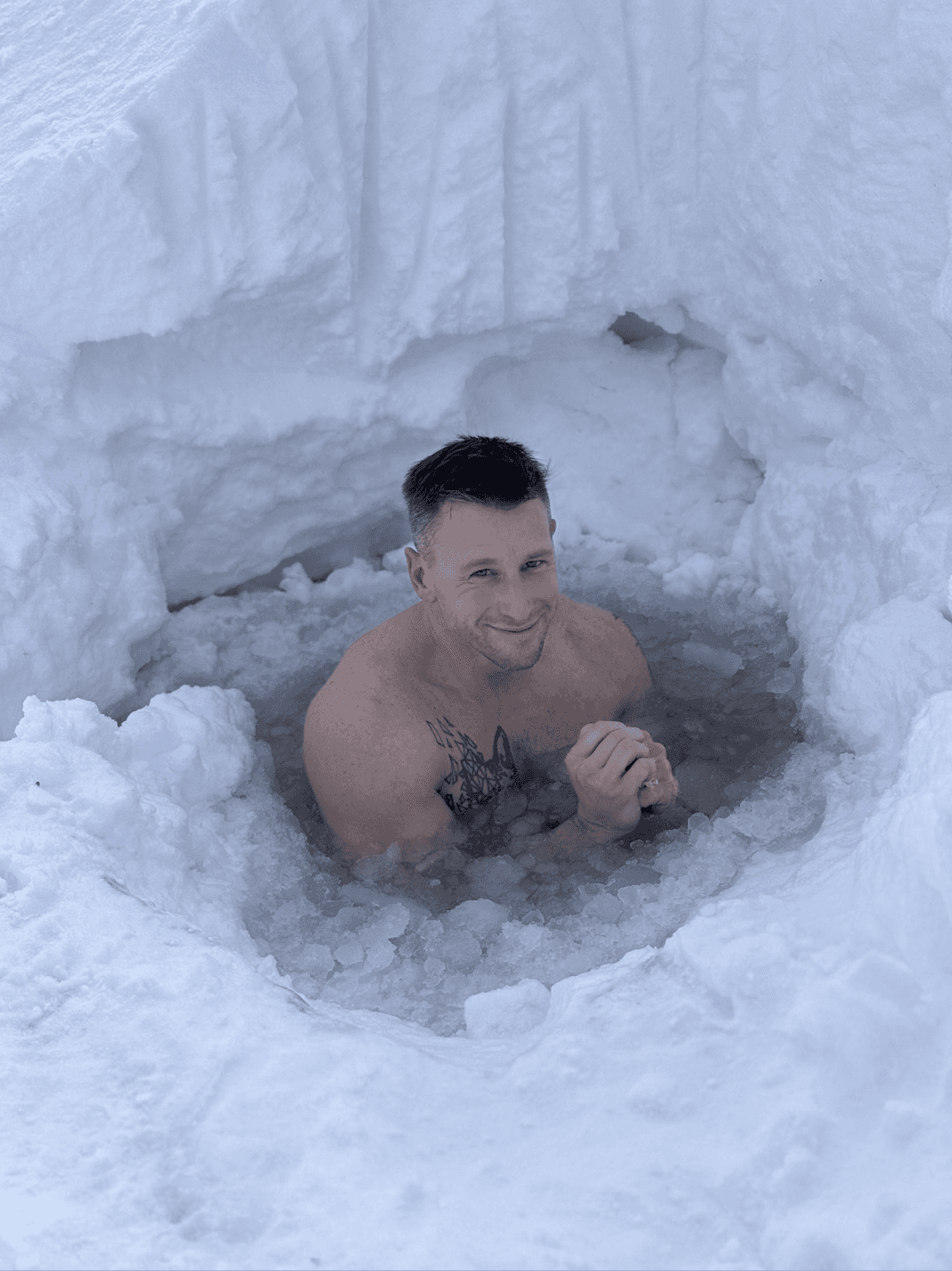 Two individuals wearing brown swimsuits sit closely together against a dark background, with the word RECESS prominently displayed in bold white text across the center.