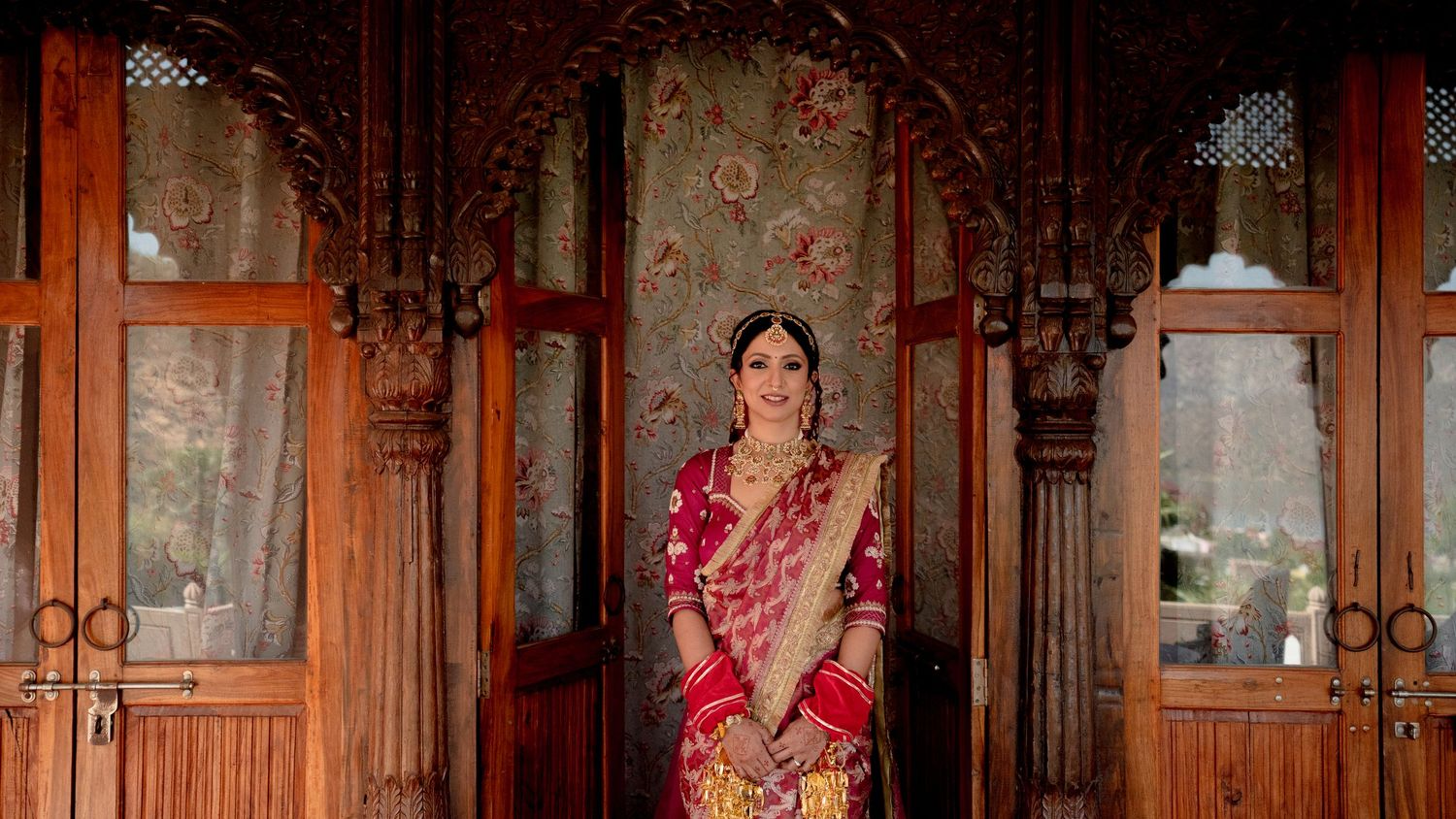 indian bride portrait heritage doorway traditional lehenga luxury wedding photography