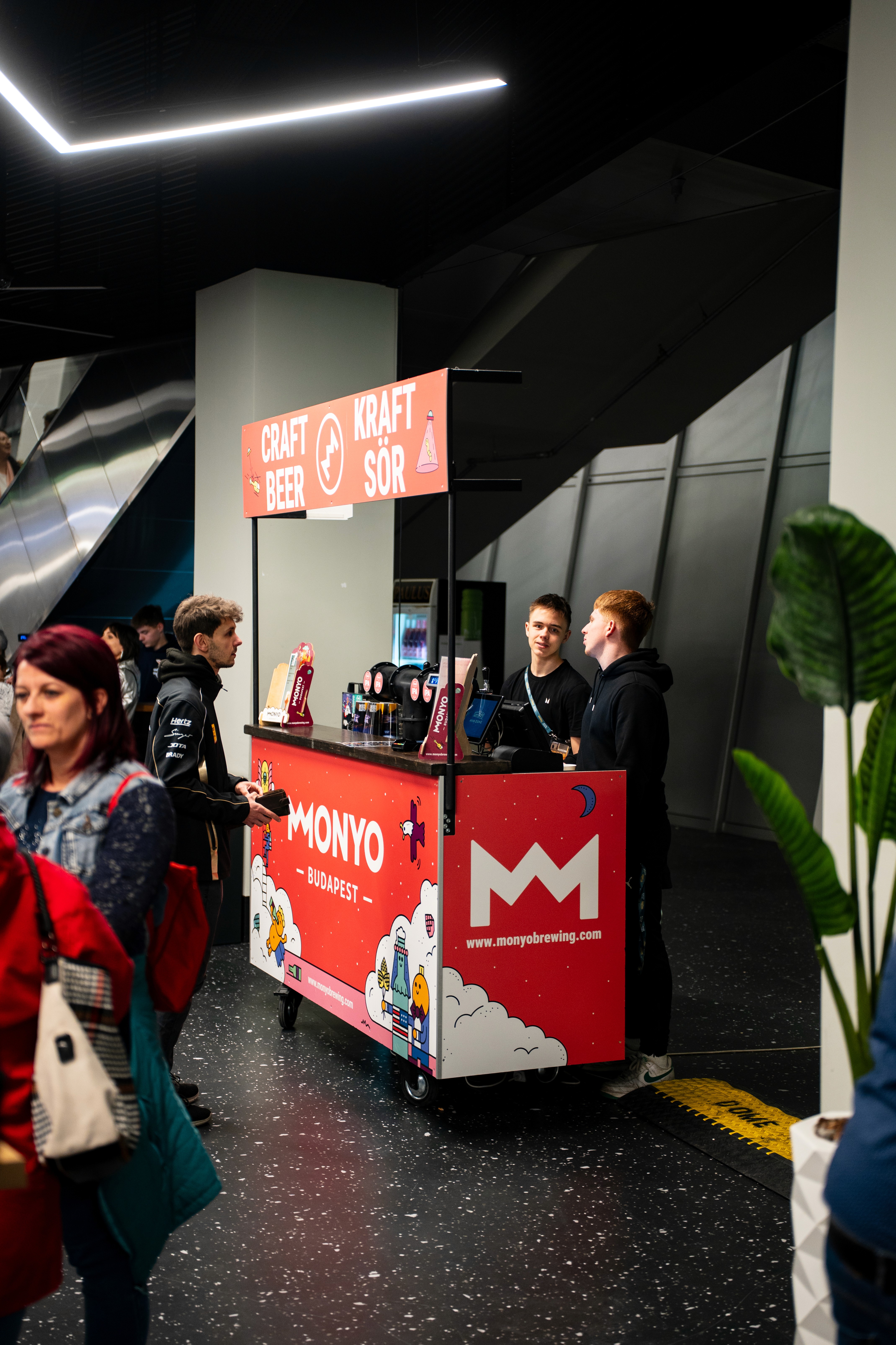 The team working together at a table with laptops, discussing business strategies or projects.