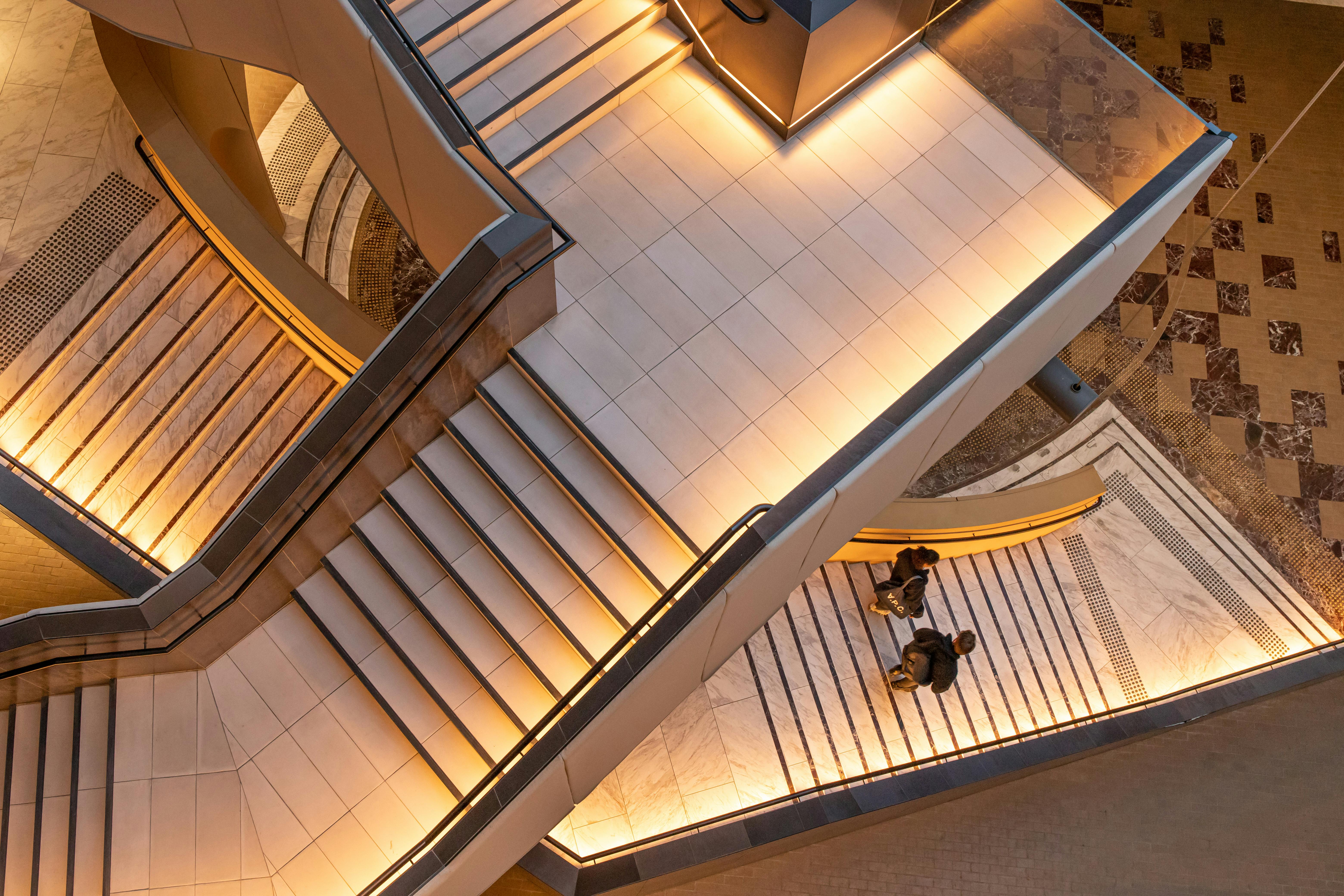 Photo by Mitchell Luo: https://www.pexels.com/photo/people-walking-down-the-stairs-3685201/