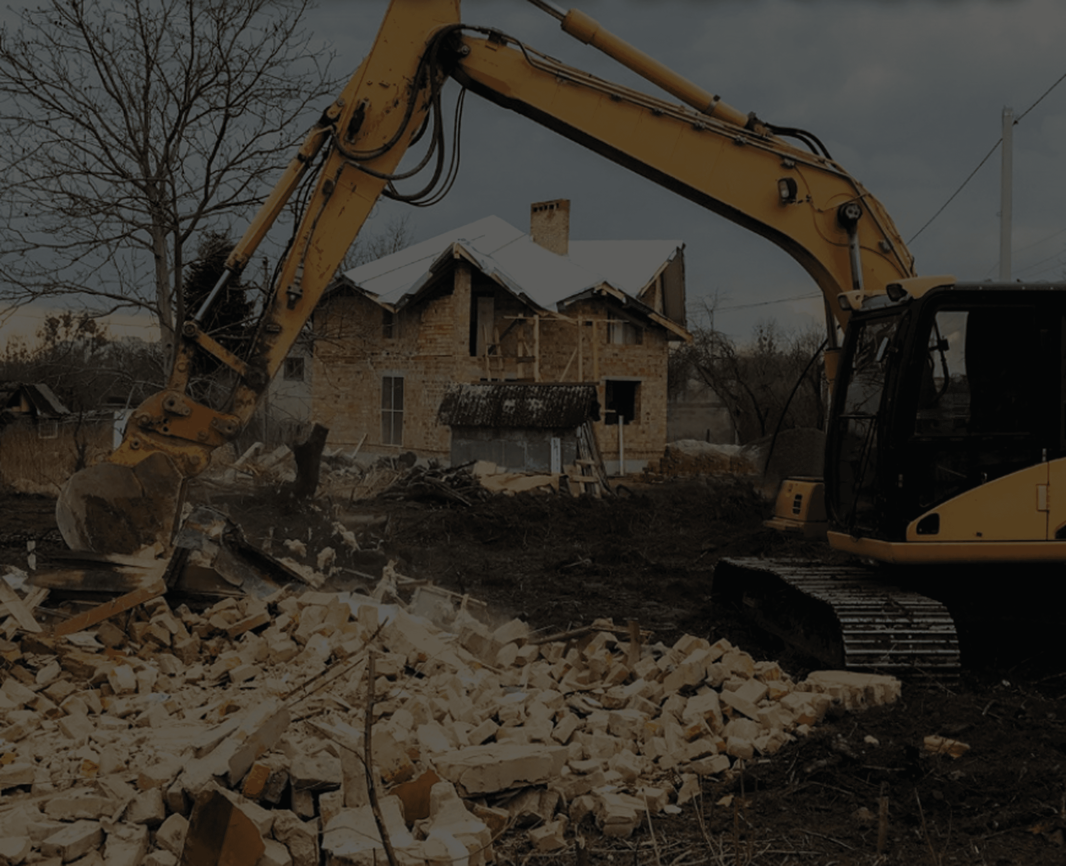 house and land demo with excavator