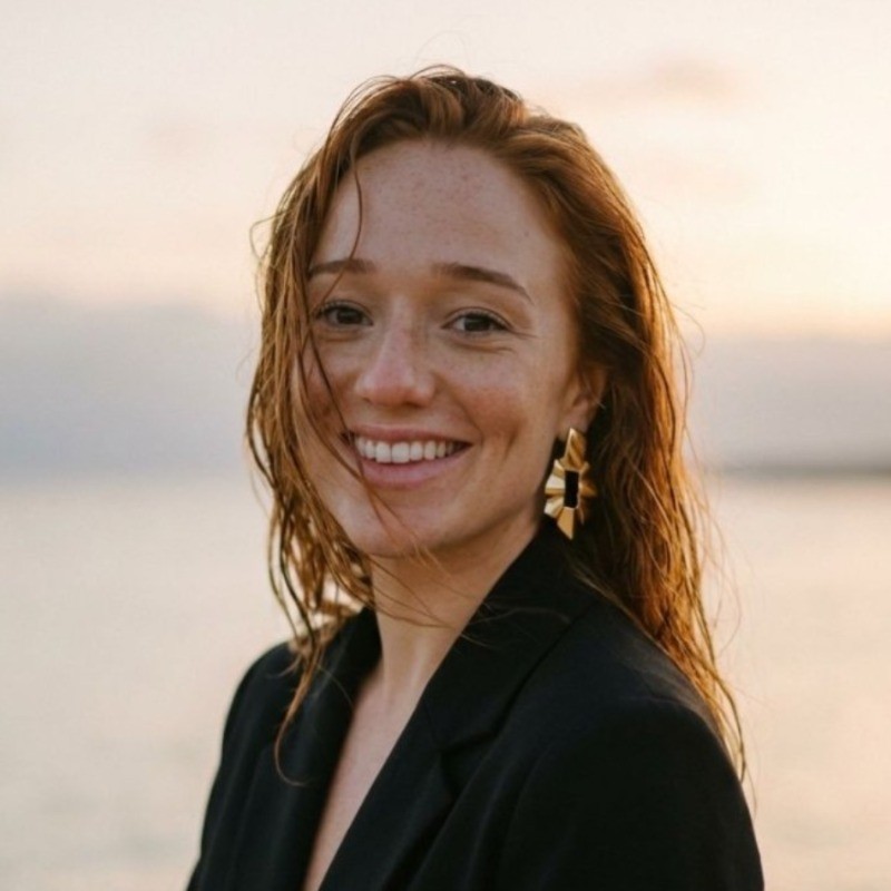 Woman sitting cross legged meditating in a mindfulness vibe