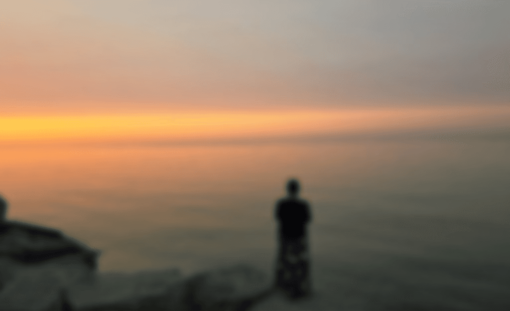 Starrlee looking out at the horizon - blurred background image