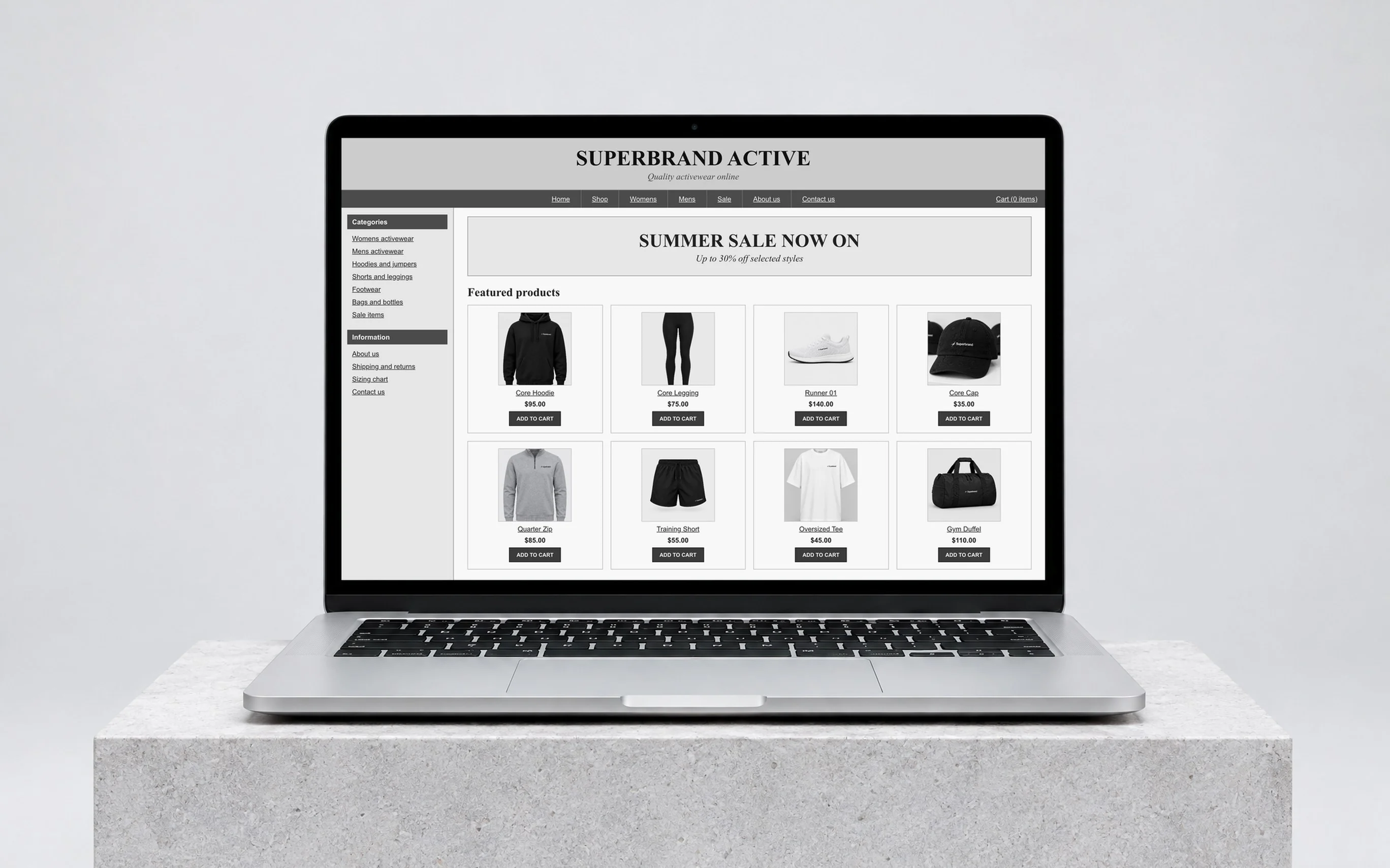 A laptop on a stone plinth showing the store before its redesign: “Superbrand Active”, a summer sale banner and a crowded product grid.